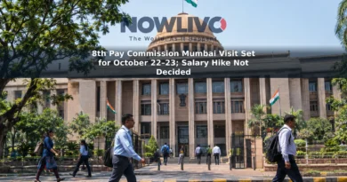 Office workers outside a government building in Mumbai