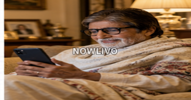 Veteran actor figure in glasses and a shawl sitting comfortably at home while looking at a smartphone.