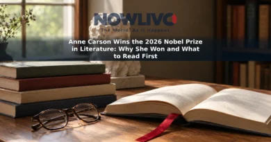 Poetry books, reading glasses and a small classical sculpture fragment on a sunlit reading table.