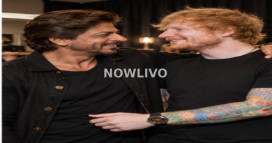Indian actor warmly greeting a famous Western musician backstage in a softly lit room.