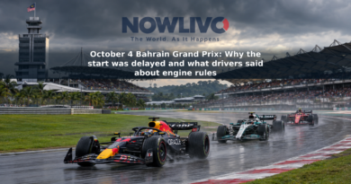 A Red Bull Formula 1 car leads a Mercedes and a Ferrari on a damp track at Sepang beneath clearing rain clouds.