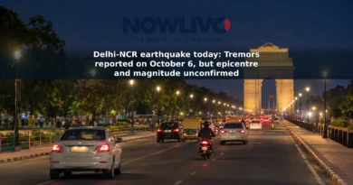 Nighttime New Delhi streetscape with India Gate in the distance, illustrating reports of tremors in Delhi-NCR.