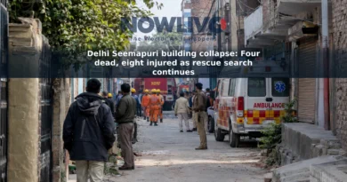 Illustrative view of emergency vehicles and rescue personnel in a narrow Delhi residential lane.