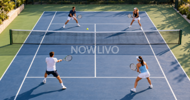 Four tennis players on a doubles court with visible service boxes
