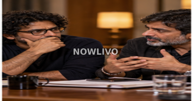 Two filmmakers or actors in deep conversation at a table, discussing a film controversy.