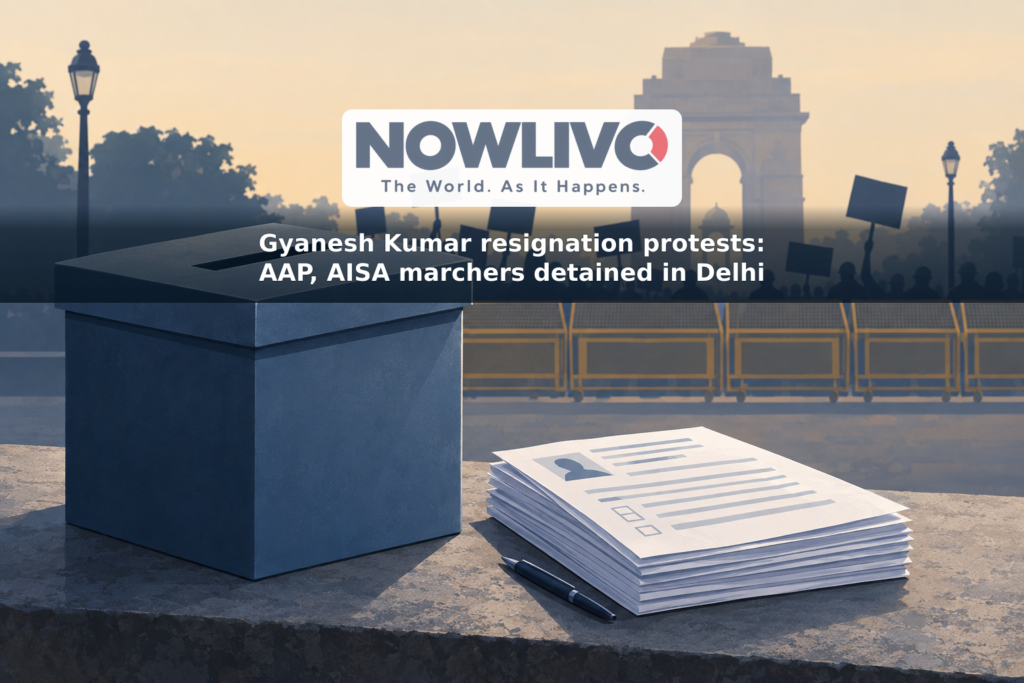 Illustration of a ballot box and voter papers before distant protest placards and a barricade.