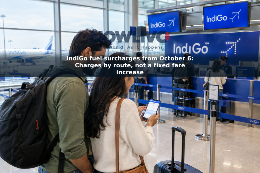 Travelers with luggage check a flight booking on a phone near an airport check-in counter.