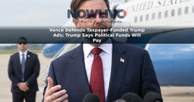 Vice President JD Vance speaks to reporters beside an aircraft on a daylight tarmac.