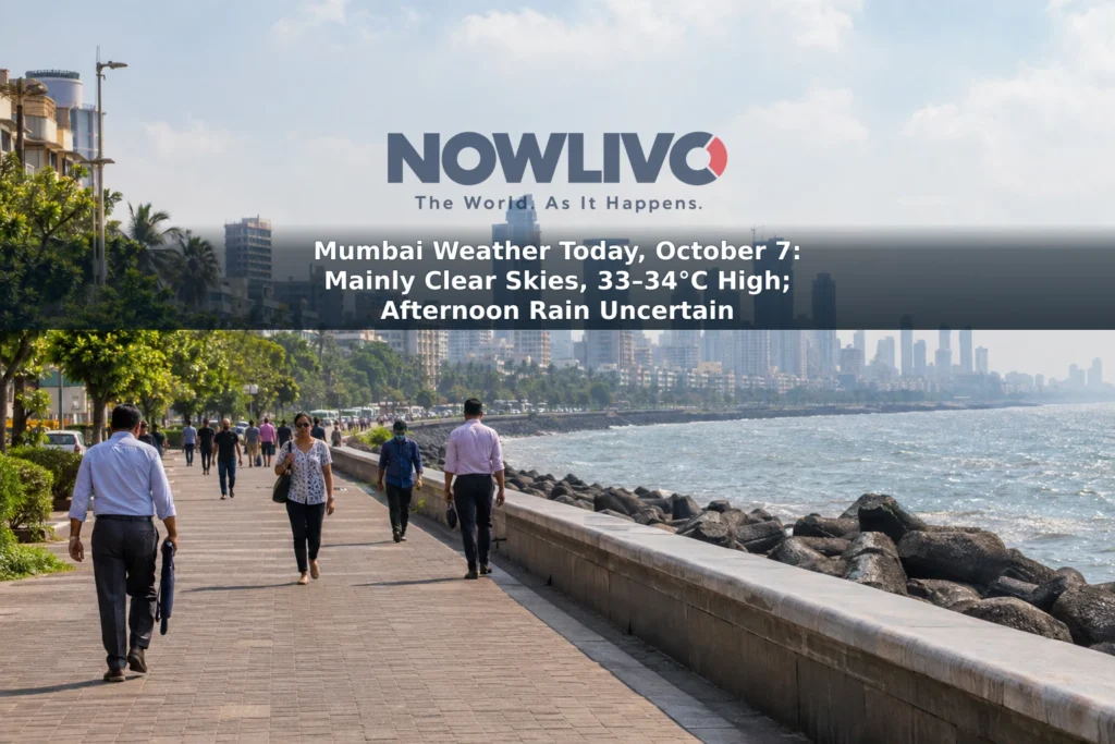 Mumbai’s Marine Drive under bright, slightly hazy skies, with pedestrians walking along the waterfront