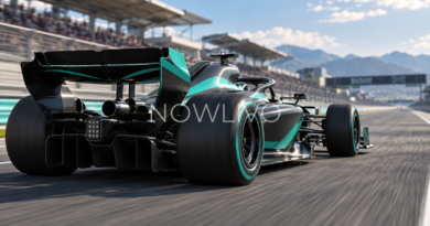 Conceptual open-wheel racing car showing front and rear wings on a circuit straight