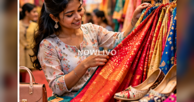 Woman choosing richly coloured festive clothing and practical footwear in a fabric boutique