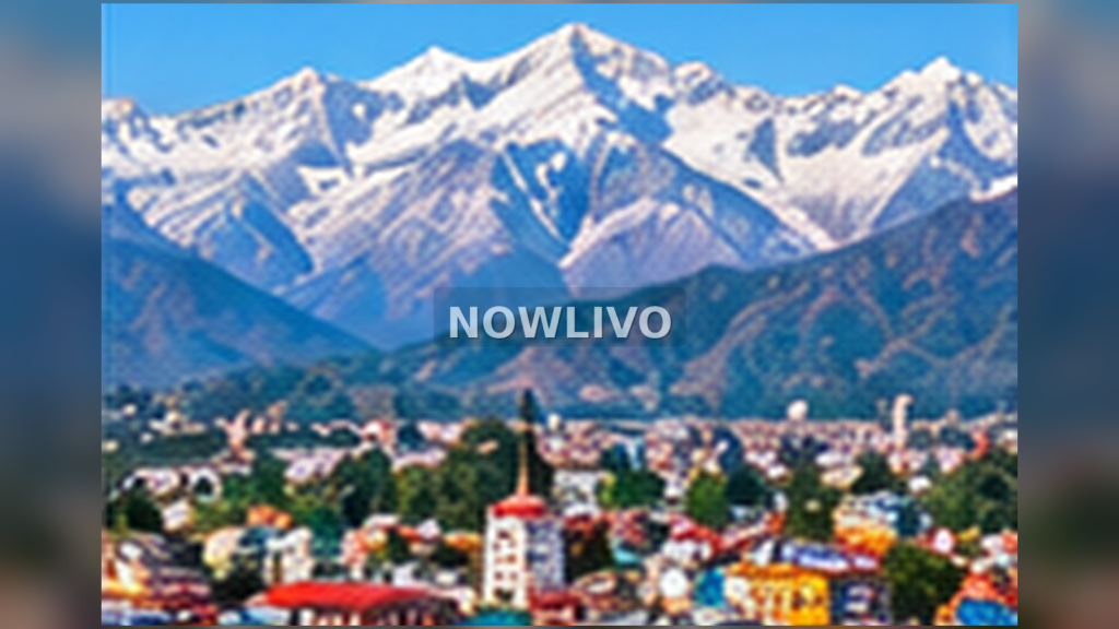 Snow-covered Himalayan mountain range above a north Indian hill town
