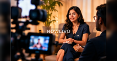 Television studio production with interviewer and presenter under warm studio lights