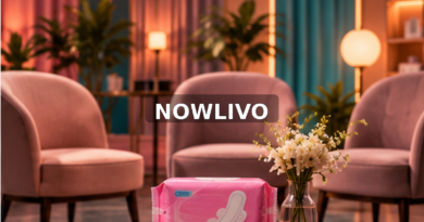 Conceptual warm rose-and-teal discussion lounge with two empty chairs, flowers and an unopened sanitary-pad packet on a table; no real contestants depicted.