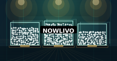 Conceptual teal game stage with three transparent containers filled with white foam balls and a centered NOWLIVO watermark, illustrating a Malayalam Bigg Boss thermocol challenge.