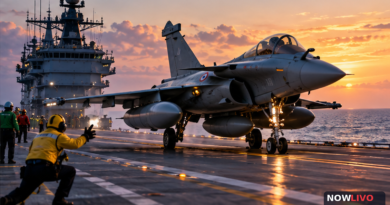 Editorial illustration of a Rafale-style naval fighter on the deck of an Indian aircraft carrier at sunset, representing trials, not a real photograph.