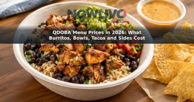 Burrito bowl with grilled chicken, rice, black beans, pico de gallo and guacamole, with queso and tortilla chips nearby