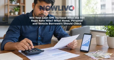 Borrower reviewing a loan statement and calculator at home.