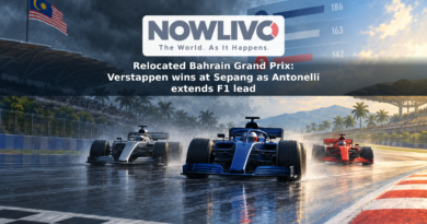 Illustration of three open-wheel race cars on a drying, rain-soaked circuit with a championship points graphic behind them.