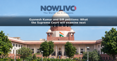 Daytime view of the Supreme Court of India building in New Delhi, with visitors outside.
