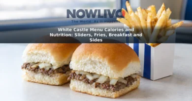 Two small beef sliders and a carton of french fries on a tabletop.